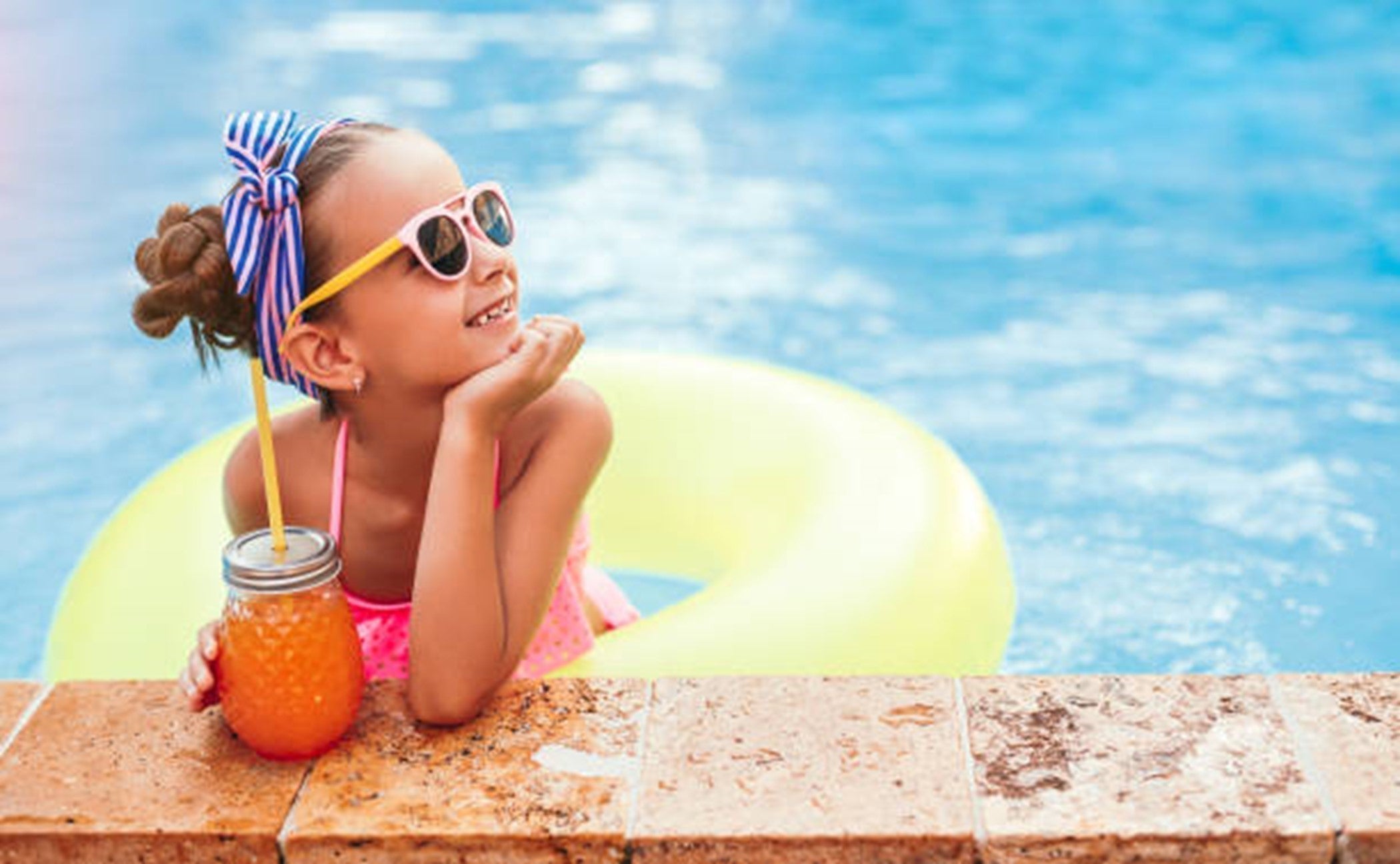 How to Stop Green, Dry, Crunchy Pool Hair Before It Takes Over Summer